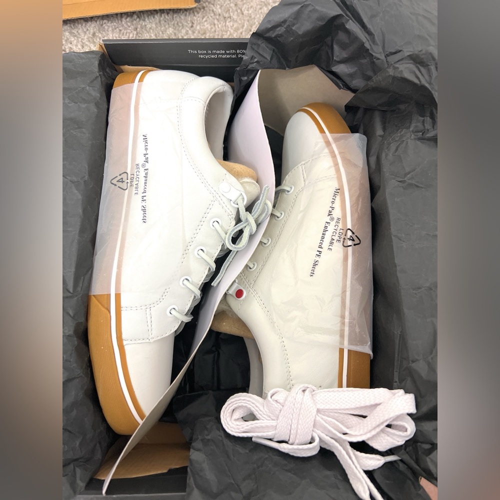 UGG’s white brock luxe leather sneaker, size 9